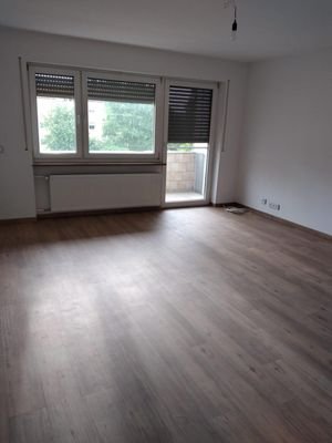 Wohnzimmer mit Balkon