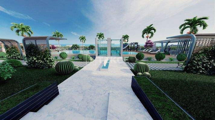 New Apartments in Mersin with a Pool and Modern Landscaping