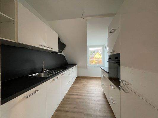 Küche mit Einbauküche