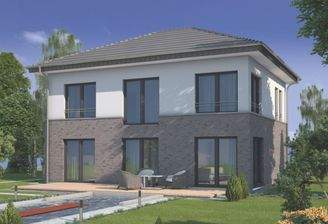 Eine Stadtvilla mit Klinker im Erdgeschoss