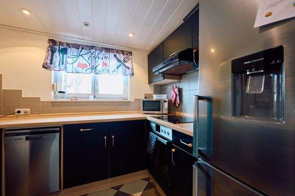 Küche mit Einbauküche 