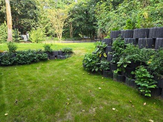 Maison Immobilien Bungalow Buchholz Ansicht Terrasse UG Garten