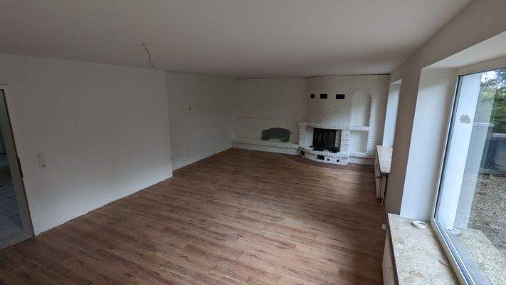 Wohnzimmer mit Kamin