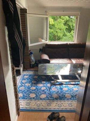 Wohnzimmer mit Glastisch