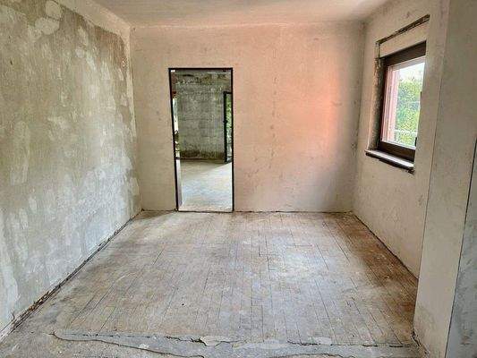 Esszimmer mit Zugang zum Wohnzimmer