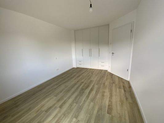 Schlafzimmer mit Einbauschrank