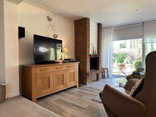 Wohnzimmer mit Kamin