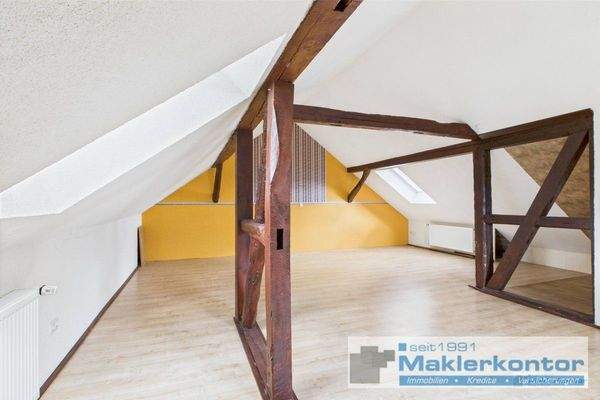 Dachgeschoss/Wohnbereich mit Kamin