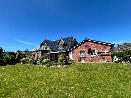 Ansicht vom Garten mit Abstellraum.jpeg