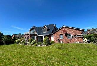 Ansicht vom Garten mit Abstellraum.jpeg