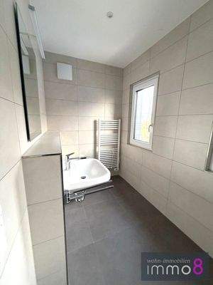 Bad mit bodentiefer Dusche