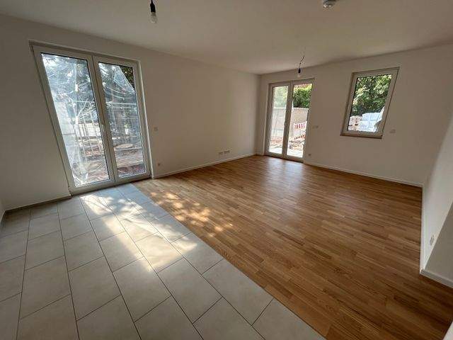 Attraktive 3- Zimmer Wohnung mit Terrasse und Garten zu vermieten! - Foto 1