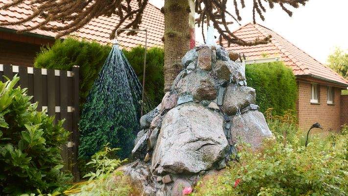 Springbrunnen mit Außendusche