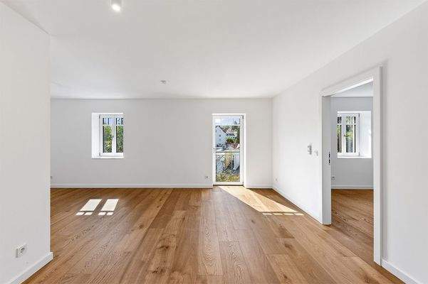 Der weitläufige und helle Wohn-/Koch-/Essbereich