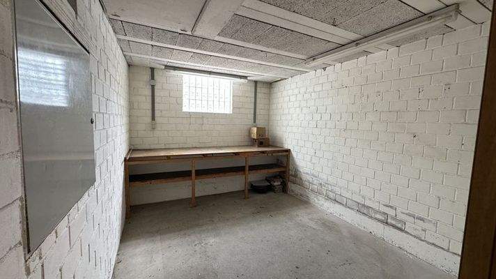 Werkstatt hinter Laube