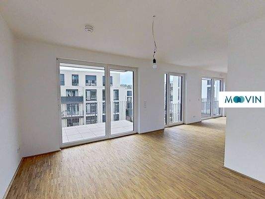 Ansicht II: Wohn- und Esszimmer mit offenem Küchenbereich