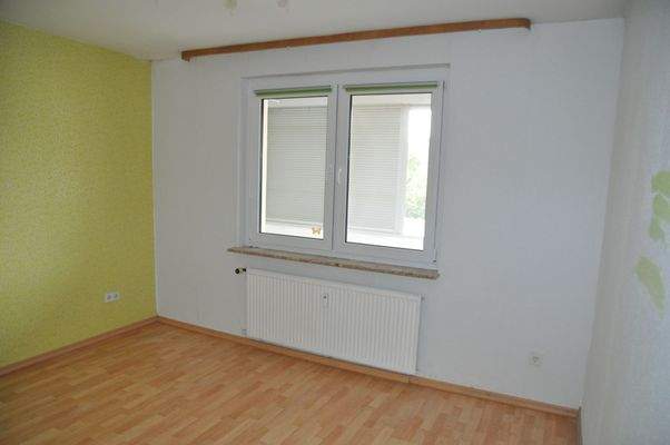 Schlafzimmer zum Balkon