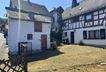 Ansicht mit Schuppen