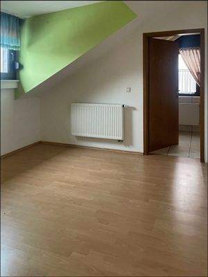 Dachgeschoss: ein gemütliches Zimmer