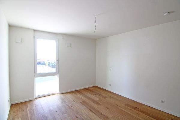 Blick in das erste Schlafzimmer