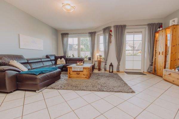 Wohnzimmer mit Gartenzugang