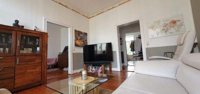 Wohnzimmer der 63 m²-Wohnung