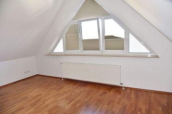 Schlafzimmer  in der Maisonette-Wohnung im OG und DG
