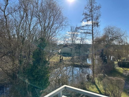 Blick vom Balkon ins Naherholungsgebiet Tischtennis, Spielplatz d4eb5f3b-00ca-4d0a-977a-0d4e18c99a01