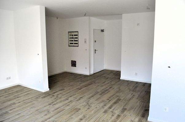Wohnzimmer in Richtung Wohnungseingang.JPG