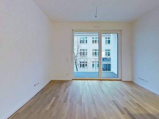 Ansicht II: Wohn- und Schlafzimmer mit Küche