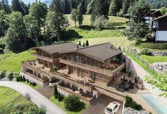 Zwei trendige Chalets in Toplage