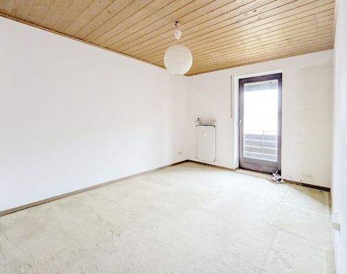 Schlafzimmer mit Balkonzugang