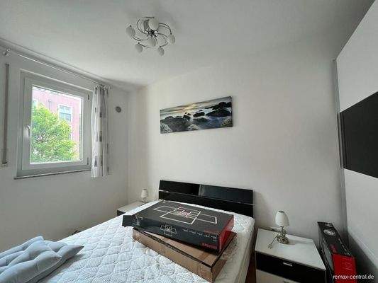 Schlafbereich hinter Wohnwand