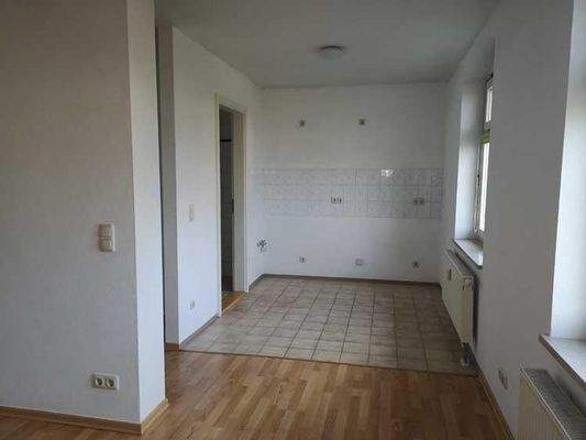 Wohnbereich mit angrenzender Küche