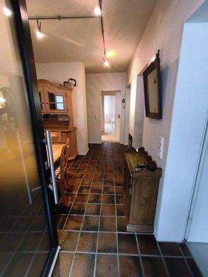Eingangsbereich mit Kaminzimmer
