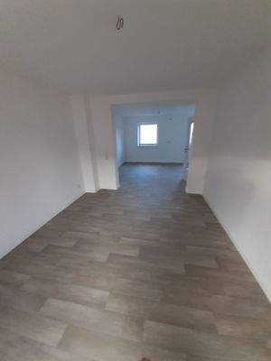 Wohnzimmer mit offener Küche.jpg