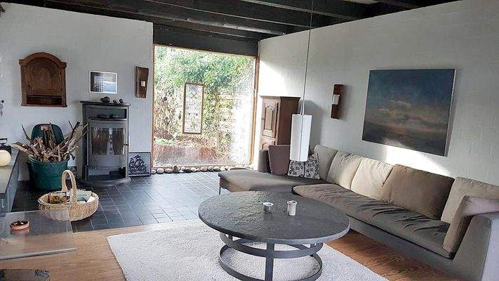 Wohnzimmer mit Kamin EG