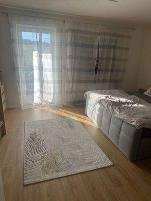 Schlafzimmer mit Balkon