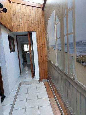 überdachter Zugang zur Waschküche