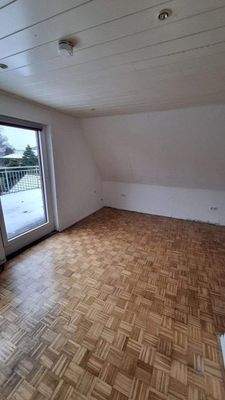 Schlafzimmer mit Zugang zum Balkon