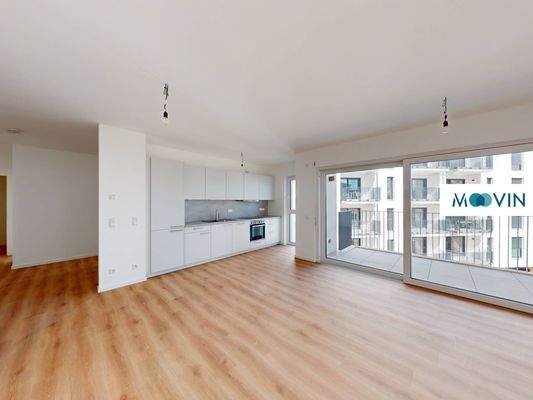 Ansicht II: Wohn- und Esszimmer mit offenem Küchenbereich