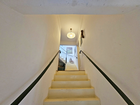 Treppenaufgang zur Wohnung