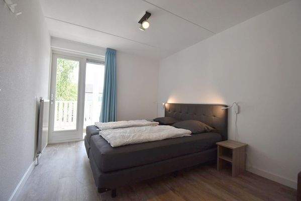 ferienwohnung-schlafzimmer-cap-helius-balcony-zuga