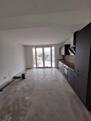 Blick vom Wohnzimmer zum Kochbereich