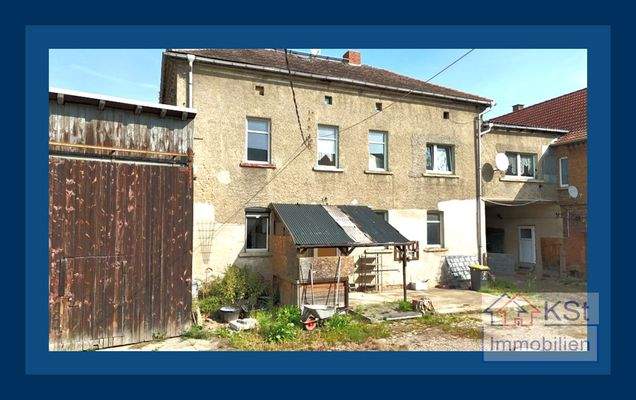 Wohngebäude mit Durchfahrt