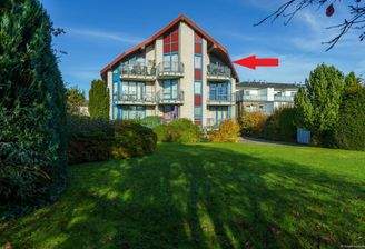 Blick auf das Haus und die Eigentumswohnung im Dachgeschoss