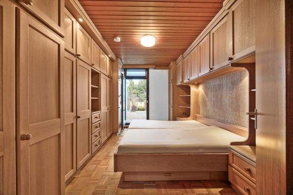 Schlafzimmer mit Zugang zur Terrasse