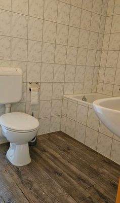 Bathroom with Tile Walls