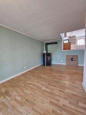 Raum Erdgeschoss mit Kaminofen