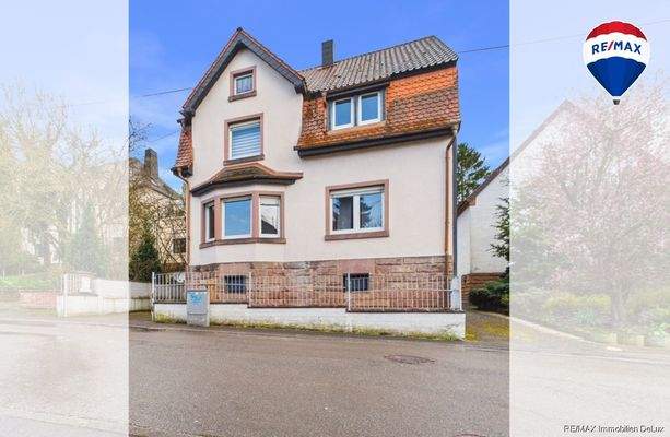 REMAX Immobilien DeLux Einfamilienhaus Frontansicht Schiffweiler Mark Borowicz